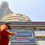 Stock markets continue to trade lower after RBI pauses rate cuts; IT firms drop