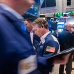 US stocks hold steady after Supreme Court strikes down Trump tariffs; markets shrug off weak growth