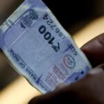 Rupee slumps 50 paise to settle at fresh record low of 94.03 against U.S. dollar